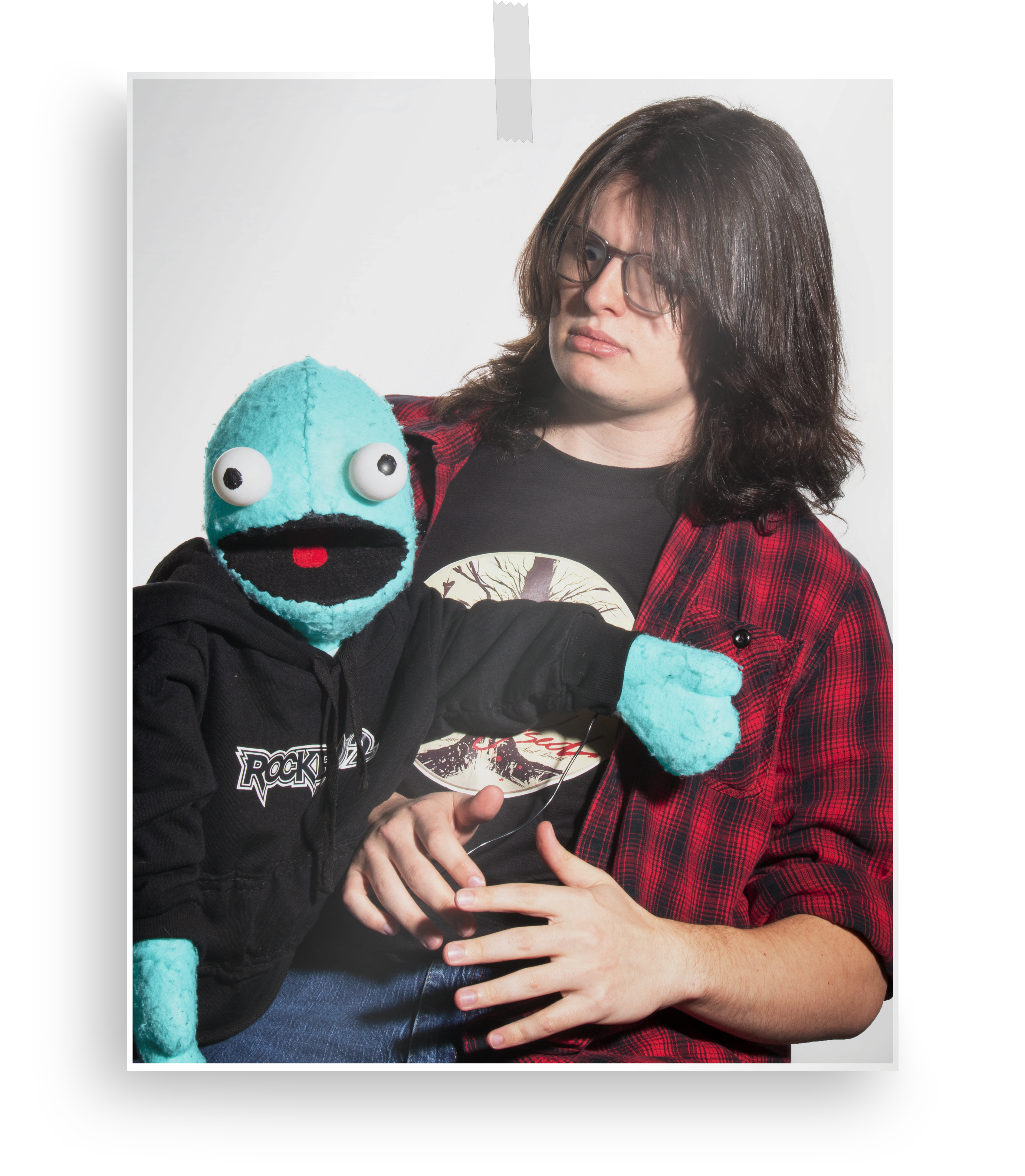 Portrait of Michael, he is being surprised by Chet the puppet.